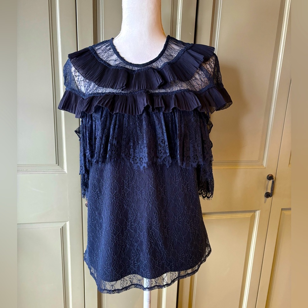 Beautiful blue lace top with drop sleeves by current air size large.